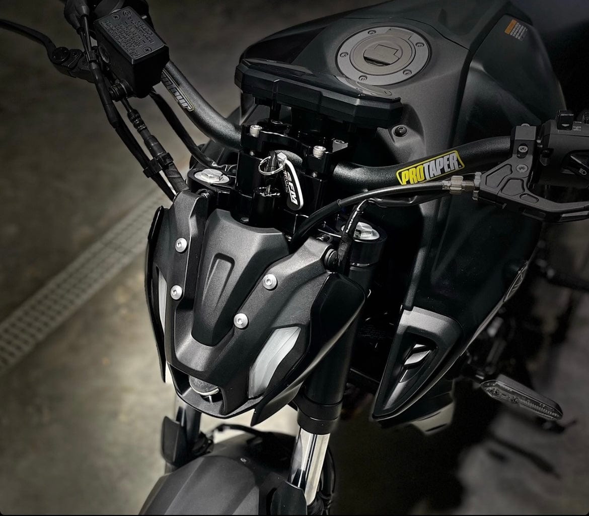 Z125 handlebar triple clamp