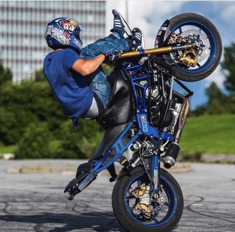 Sick Innovations zx6r 03-04 636 cage stunt rider doing highchair wheelie