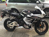 white black red Honda 600RR with stunt cage