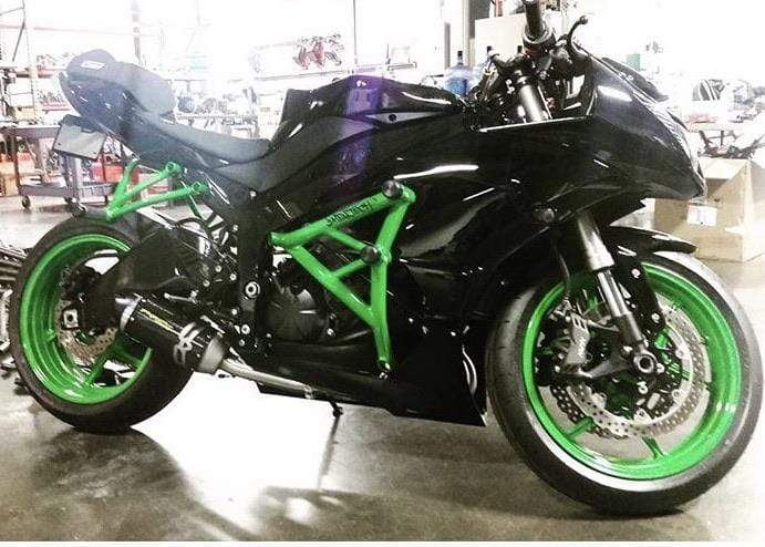 candy green stunt cage on a Kawasaki ZX6R 636 by Impaktech