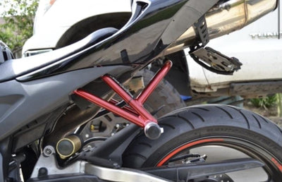 Honda 600RR subcage candy red rear stunt pegs