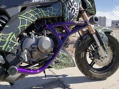 Kawasaki Z125 crash cage stunt cage New Breed stunt parts purple cage